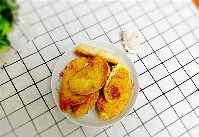 怎样做油炸馍 d89a54f7880a4c9ea000a3a2f972284e.png