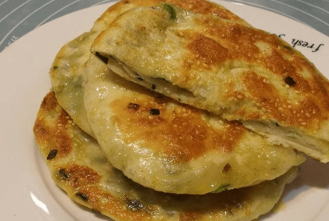 在家怎样做葱油饼好吃 7c0de89c29b24f7cb6474ba3610cdb3b.png