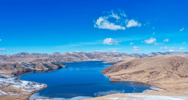 西藏自驾游第四天翻越红拉山在芒康遇见海拔4300米的莽措湖