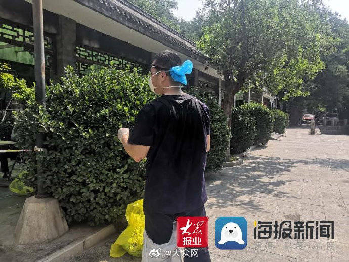 核酸|实拍北京东城区核酸检测采样点现场：医生背部全部湿透