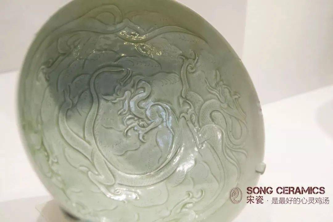 中国南宋越州窯影青貼塑人物紋魂瓶 中国收藏网---新闻中心--青白瓷长颈堆塑瓶