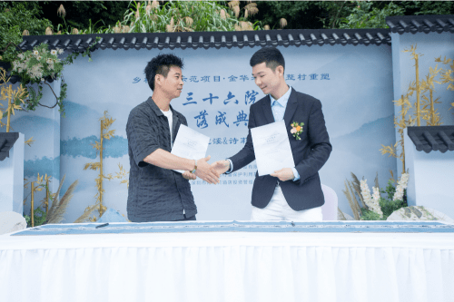 张锦林与许鑫明签约