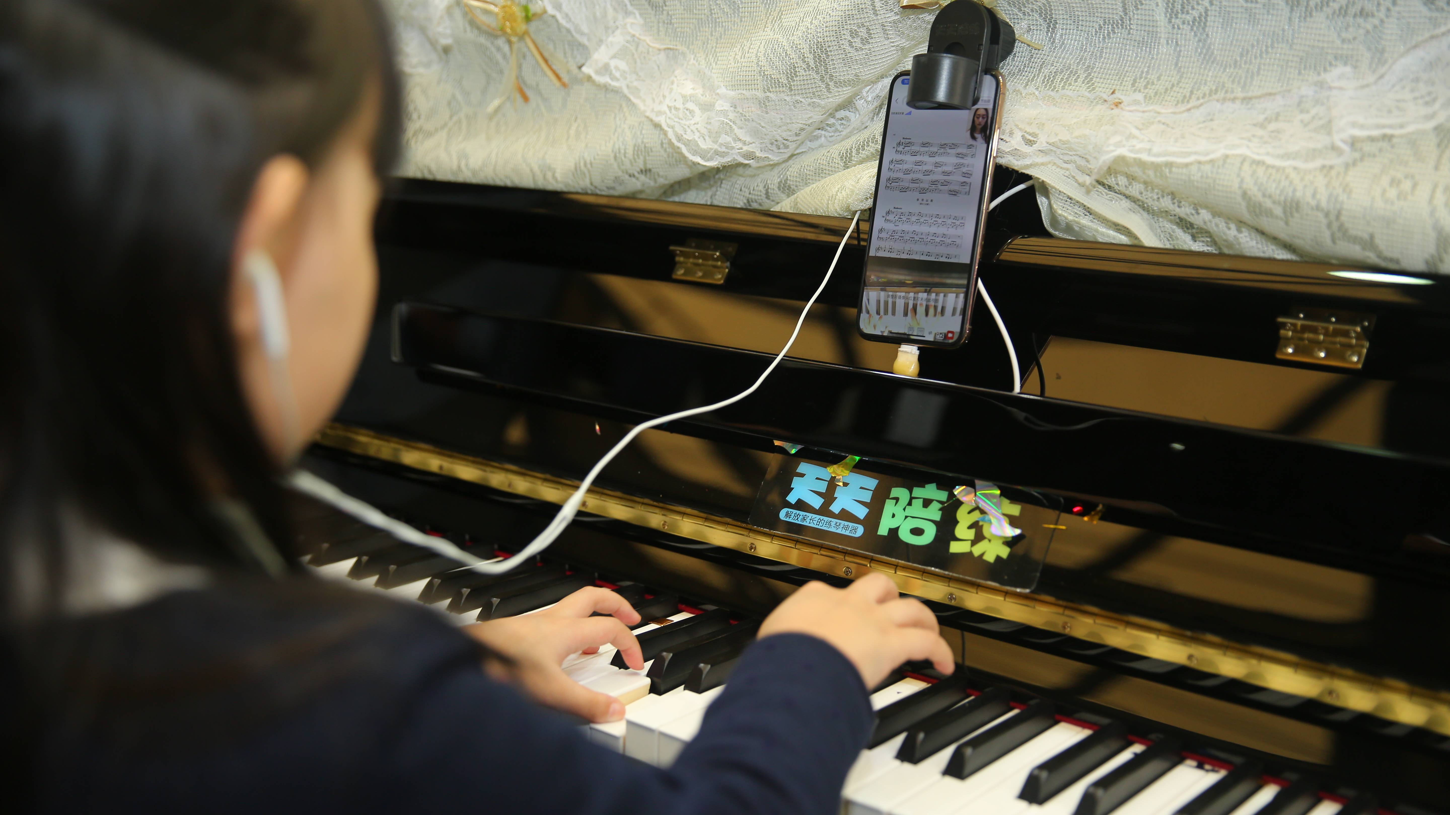 钢琴陪练软件"天天陪练3.0"升级亮相乐器展