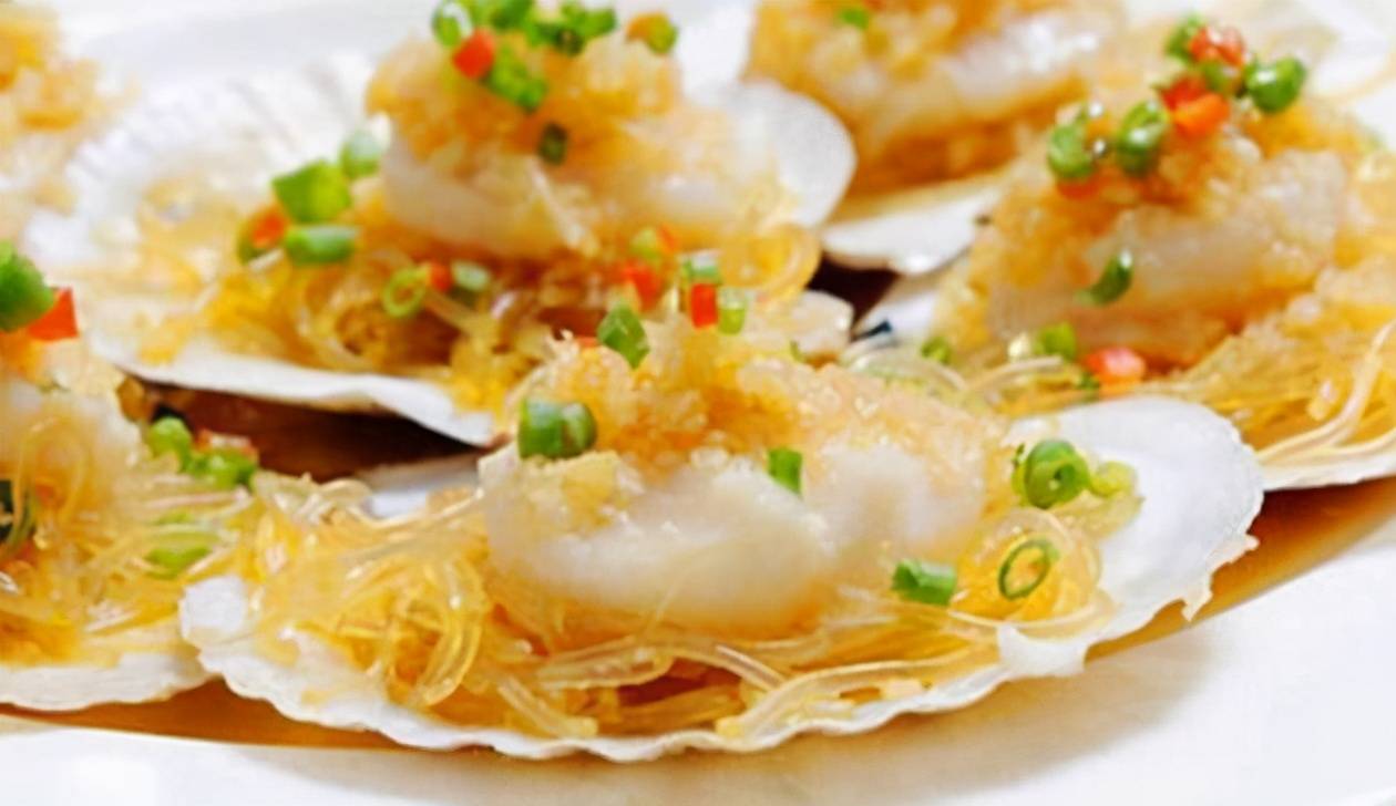 扇贝肉黑色的是什么东西（河蚌肉上的黑色是什么）