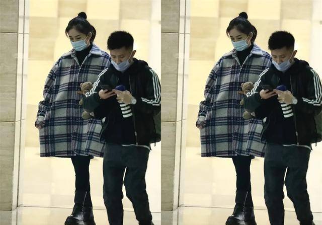 大衣|谢娜怀孕后首次走机场,穿大衣孕肚遮不住,只长孕肚腿比空姐还细