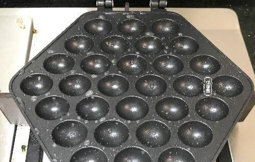 美食|早餐吃鸡蛋仔,我能吃三个,看着一个个圆球好看,没想到吃着更香