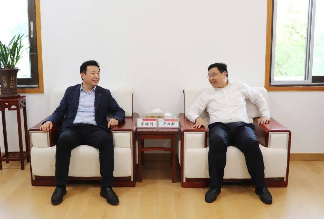 李晓刚会见卢治轩刘阳青一行