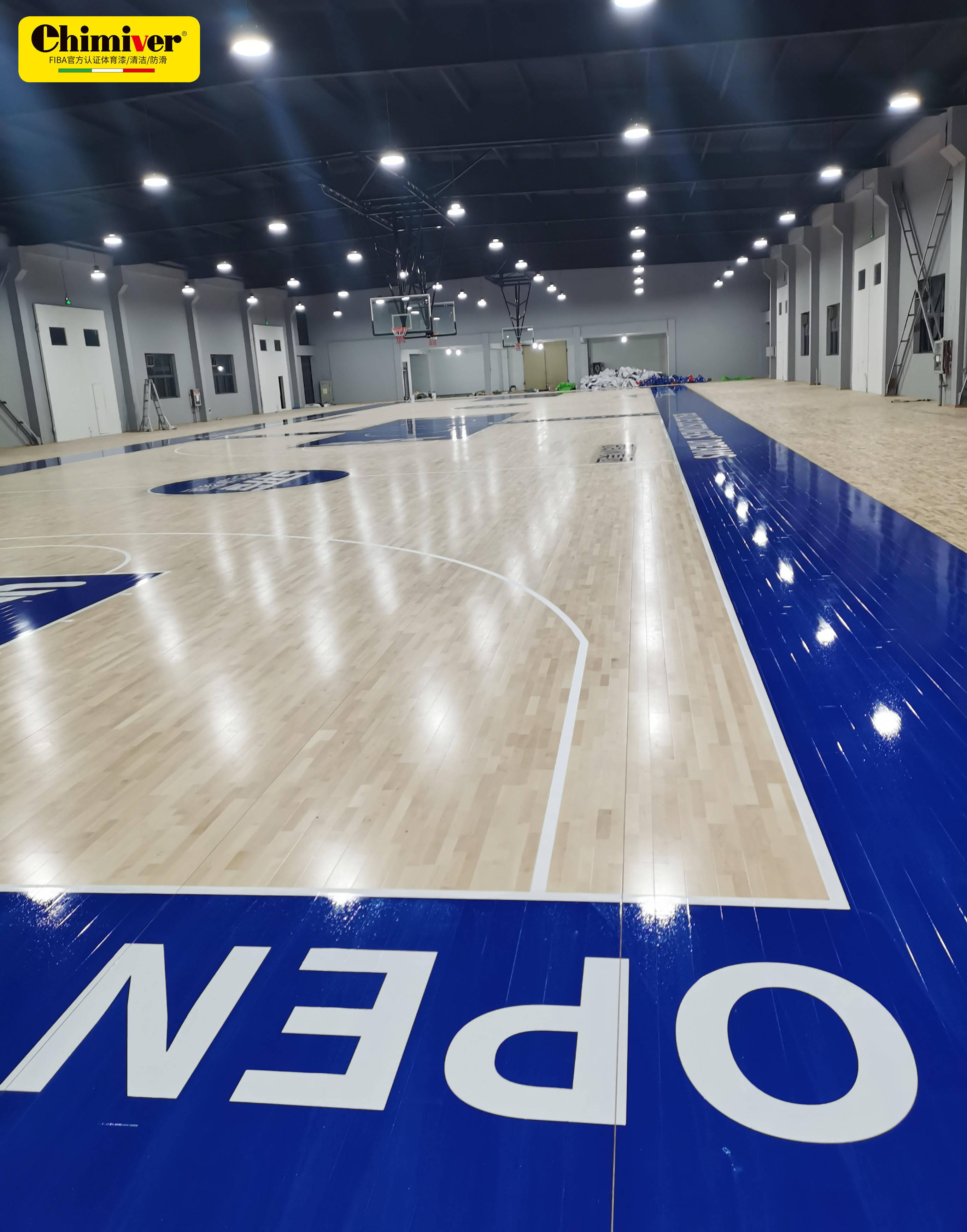 nba雷霆队篮球馆地板配色二次创新应用,昆山思凯林篮球场地板油漆翻新