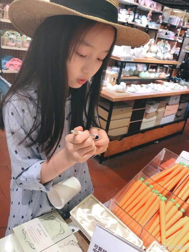 纪姿含返回搜狐,查看更多