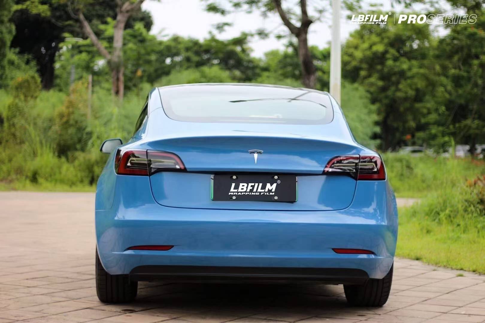 特斯拉model3-lb改色膜高亮阿布扎比蓝,透明的澄澈的蓝色_搜狐汽车