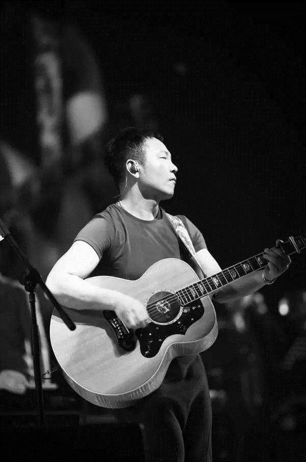 许巍:当兵遇到一生挚爱,结婚24年无绯闻,没有孩子成遗憾_音乐_父母