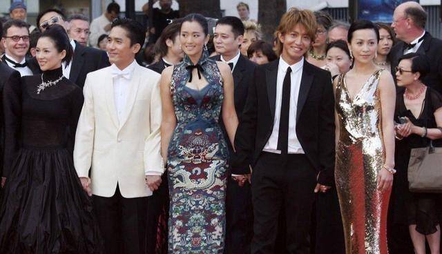 刘嘉玲问梁朝伟:"左手一个巩俐,右手一个章子怡,开心吗?