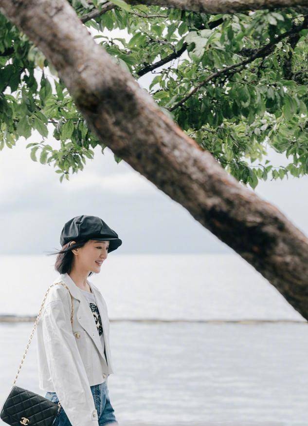 周迅早期造型被曝光,染橘黄发色鬼马精灵,比"女团"美多了_女性_气息