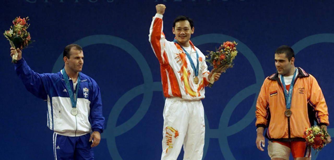 举重冠军占旭刚:退役后娶初恋空姐,带出奥运冠军徒弟,官至副厅_姚健