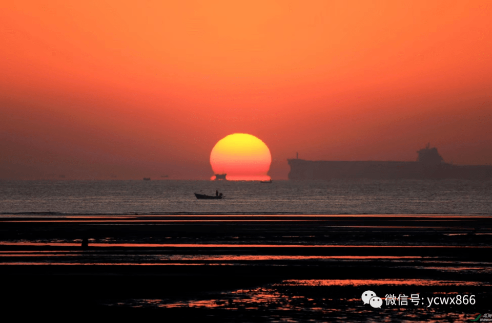 太阳升起来的图片海边图片