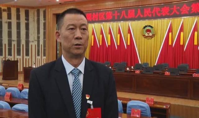 王连庆刘伟区长作的政府工作报告求真务实,催人奋进.