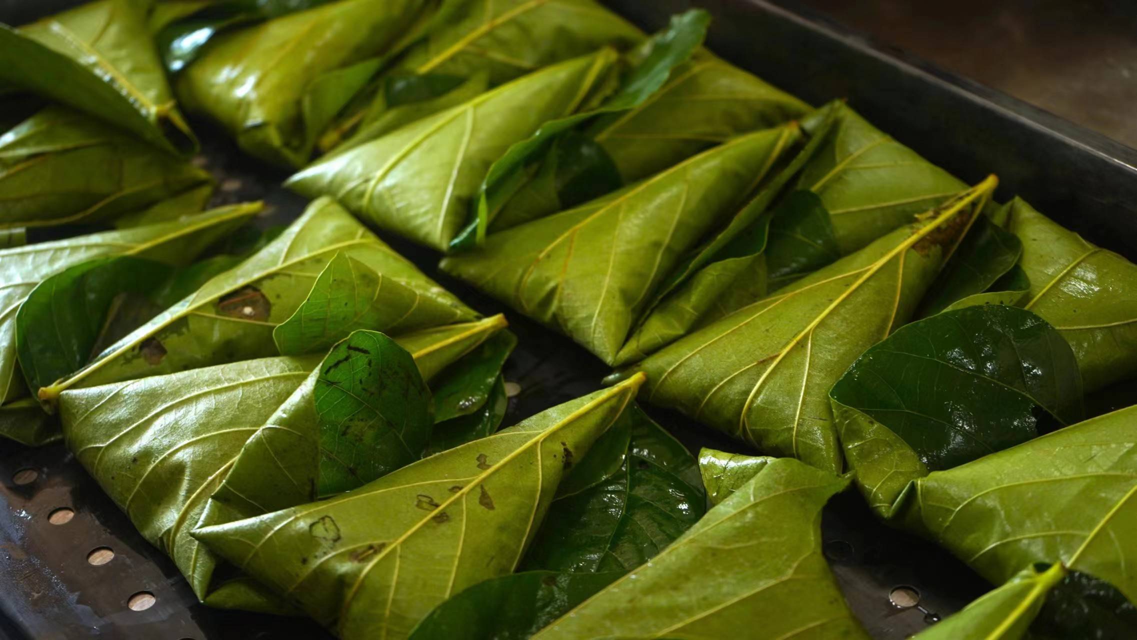 小小桐叶粑 赋民大产业——"乡得艺彰"国情观察实