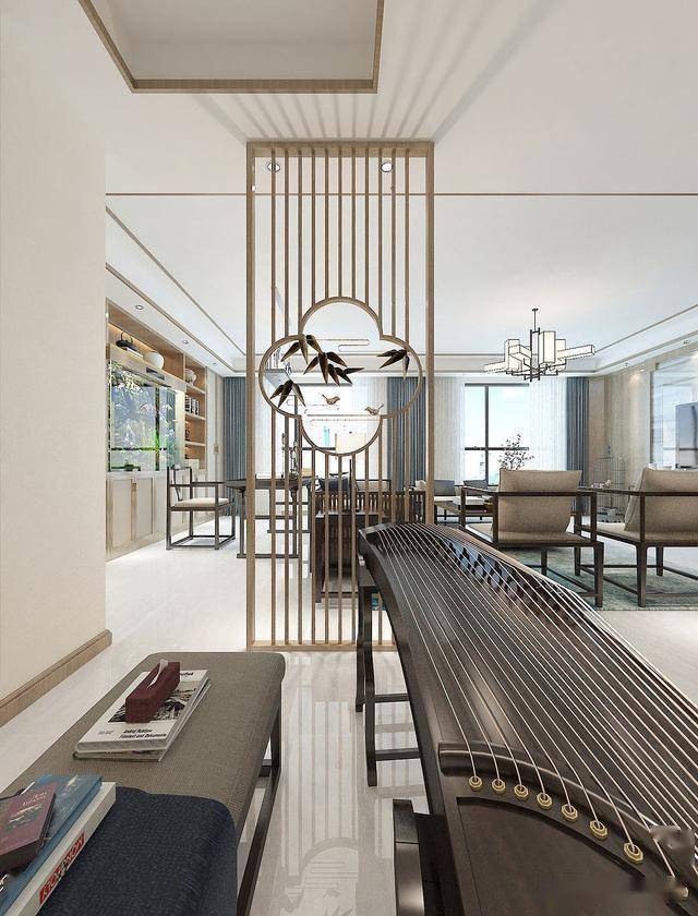 客餐厅书房空间划分人口流动性强,玄关的古筝使整个空间更具古典气息