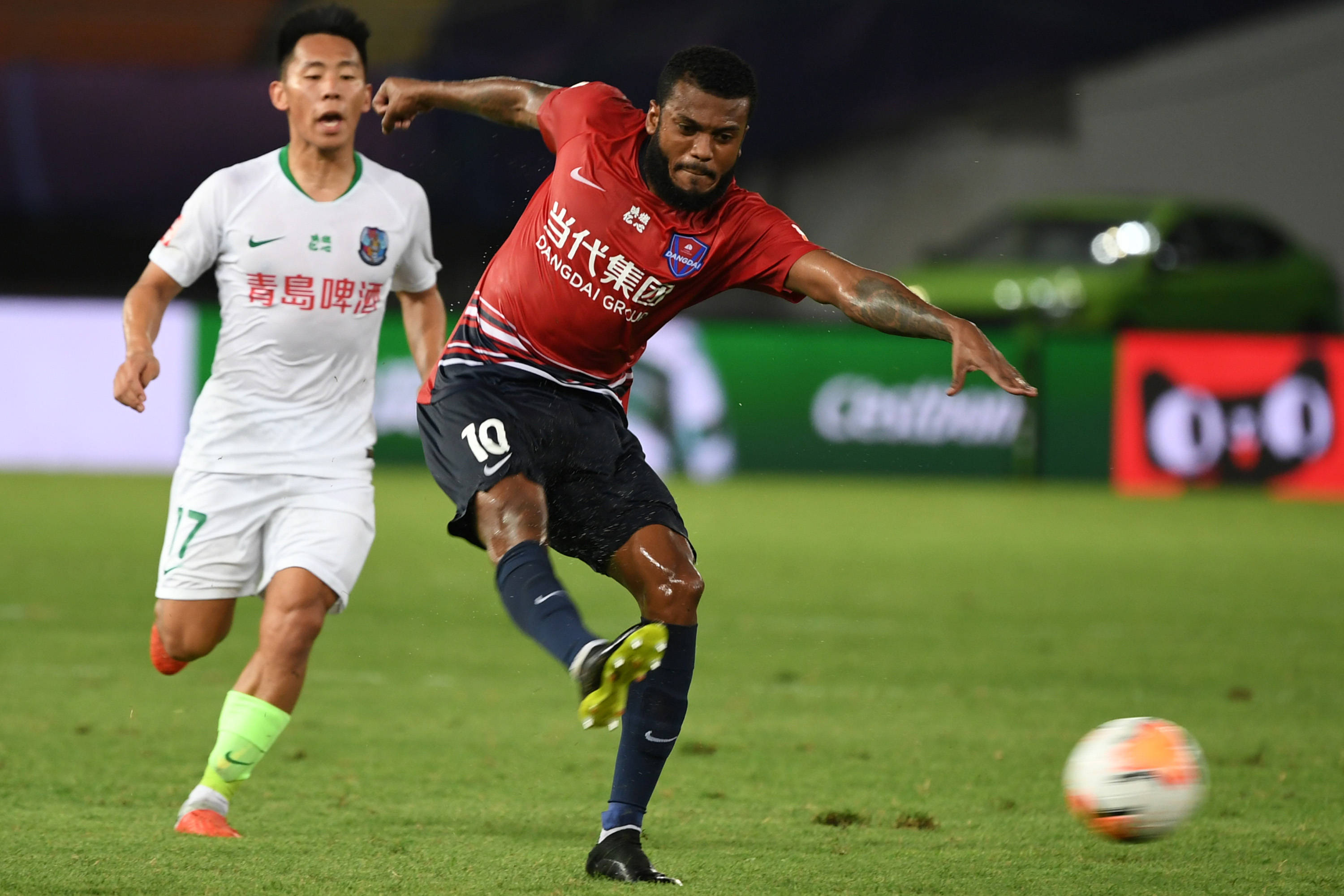 足球——中超:重庆当代平青岛黄海青港