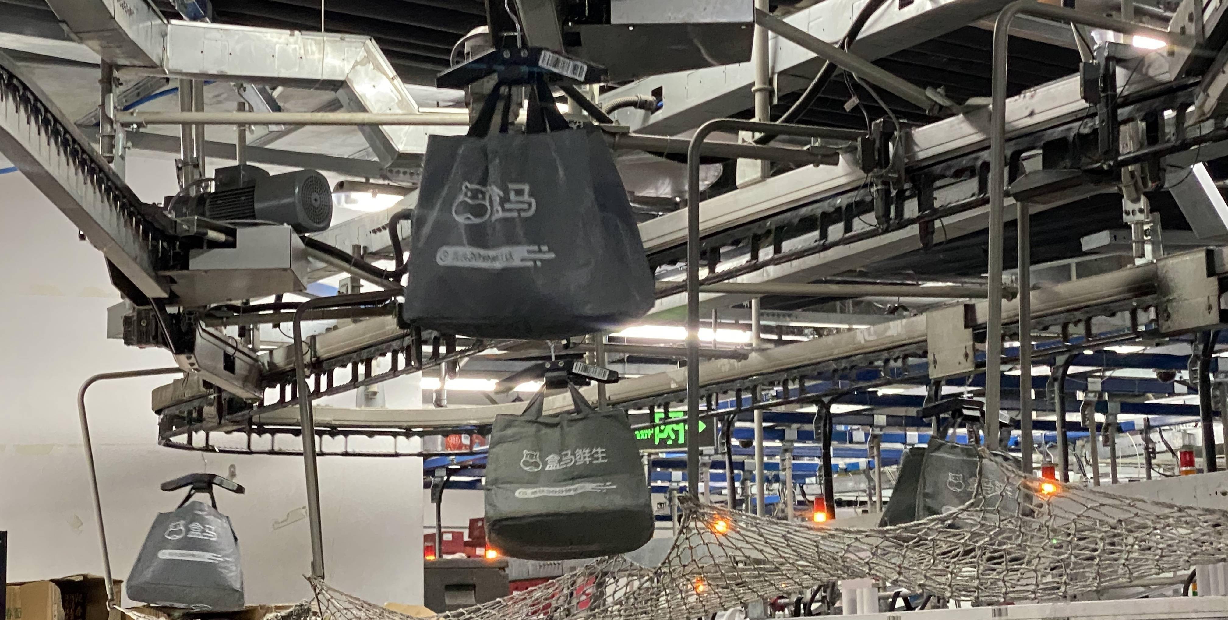 盒马悬挂链系统首次曝光单店线上日超2万单背后的盒武器