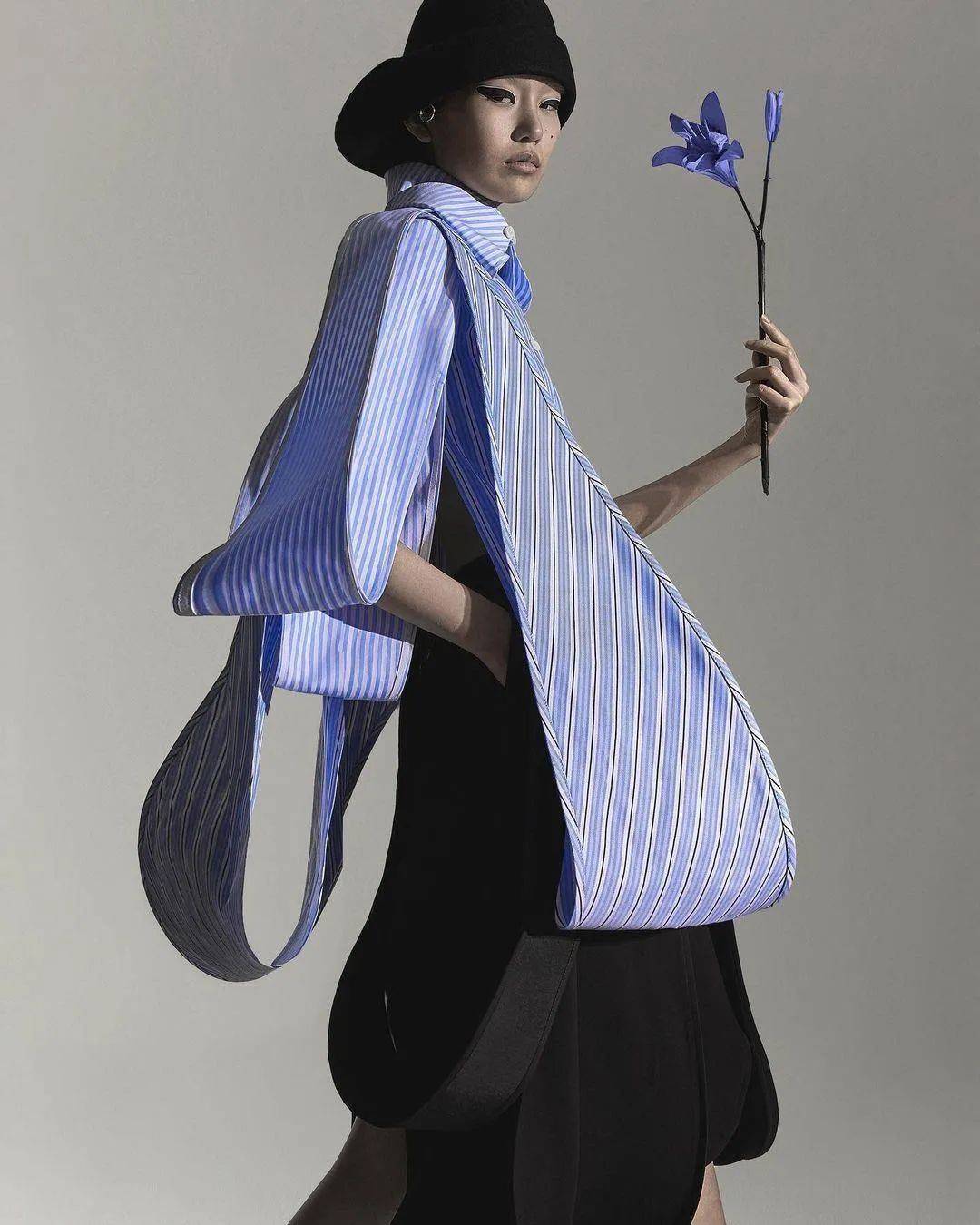 先锋前卫的时装雕塑式剪裁,robert wun再次展现对于花卉设计的浪漫