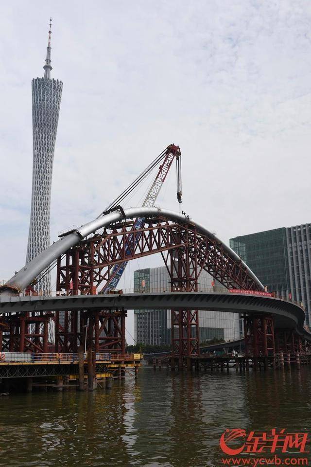 广州首座跨珠江人行桥顺利合龙预计6月30日完工