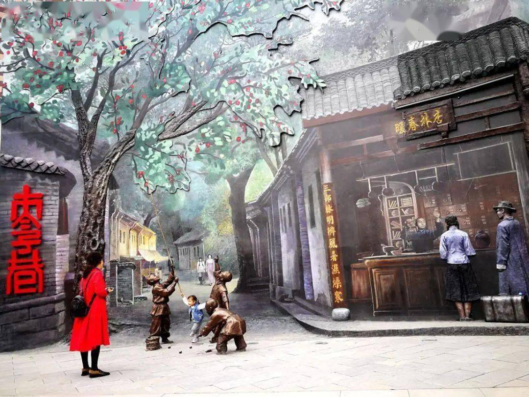 老成都元素的雕塑墙绘连井盖上都是玉林西路的专属logo还有中国传统