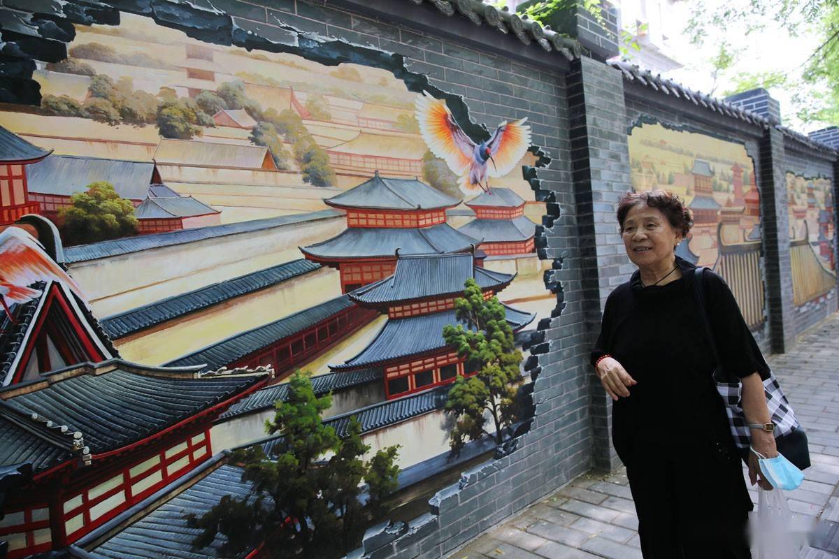 西安城墙根画大唐盛世附近居民说真美成了网红打卡墙