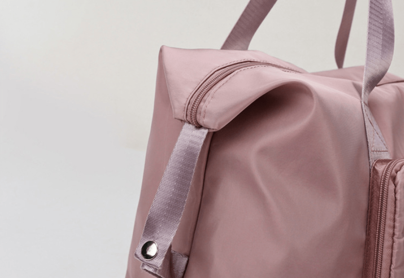 旅行包怎么放东西 d4254028e1ec4609adfe7e3474b4a9f5.png