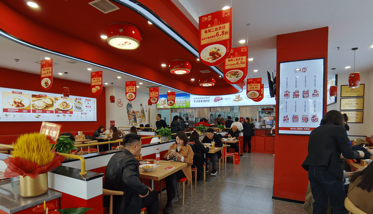 陕北非遗文化美食红腰鼓双店同开走进丹东走进吾悦