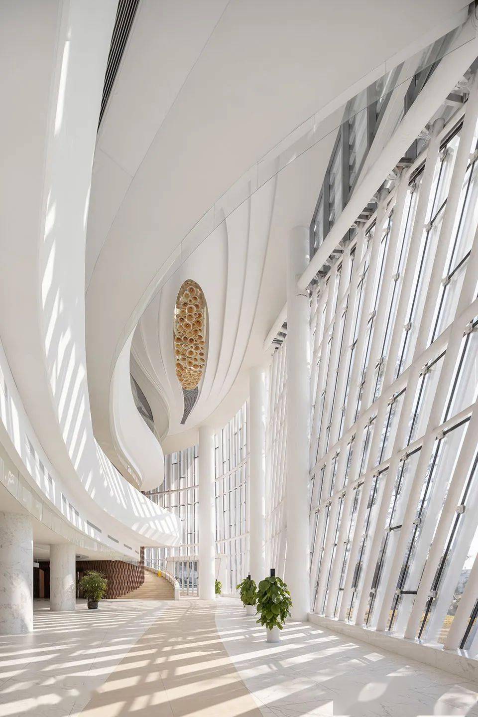 北门厅和大台阶08sfap▲大剧院北侧门厅,曲面grg和折面大理石板相