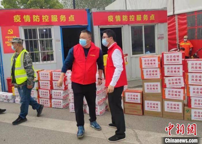 抗击新冠肺炎浙江义乌统战志愿红助力防疫健康绿