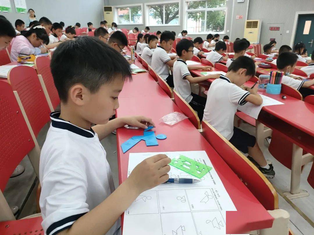 趣味七巧板智力大比拼春晖学校小学部举行趣味七巧板比赛