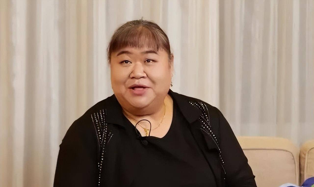 "举重冠军"唐功红:30岁退役,国家奖励4室2厅,老公长得帅_张美兰_比赛