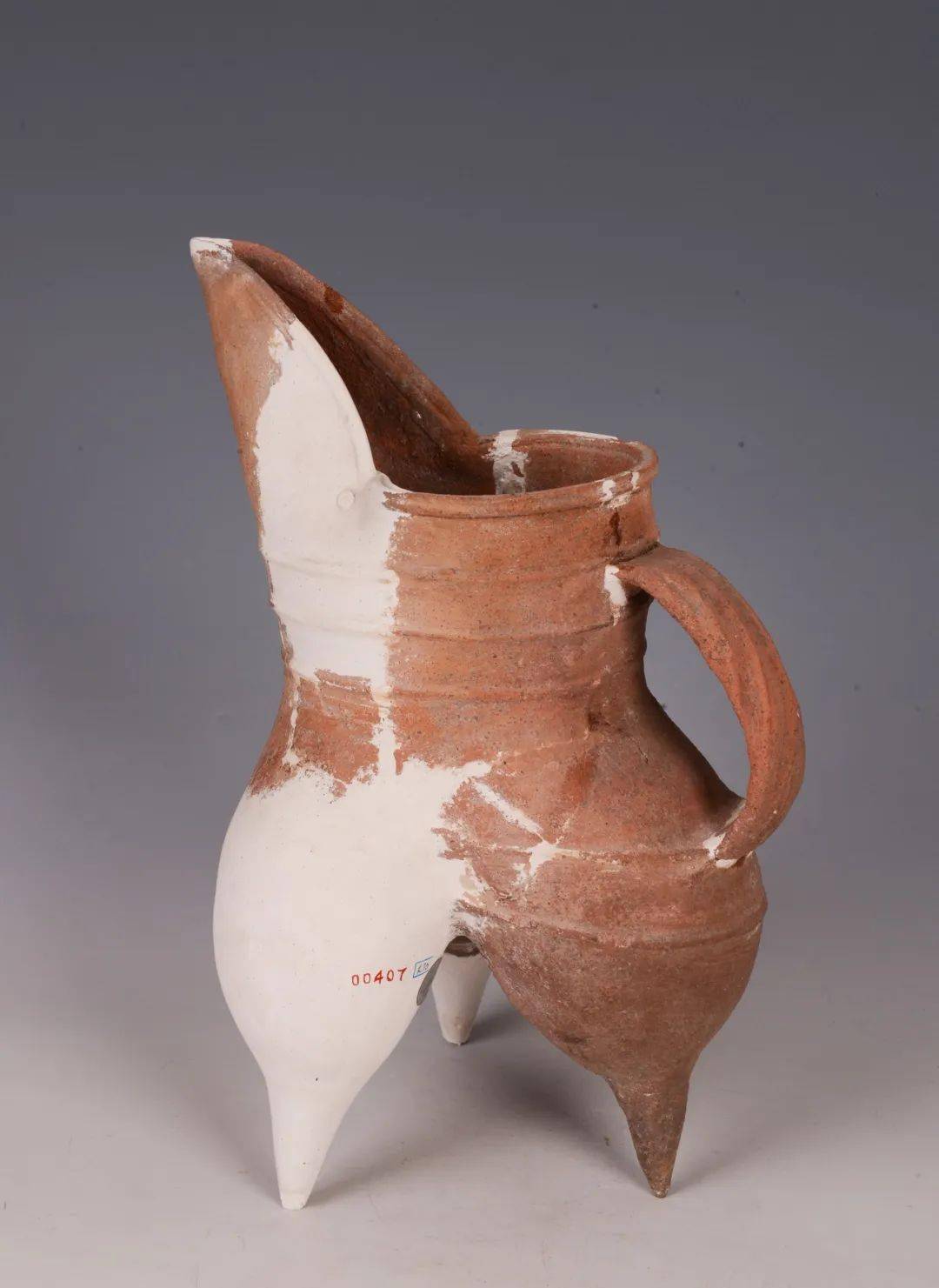 东岳石遗址出土双孔石刀霸王台遗址出土青铜戈青岛地区考古发现与成果