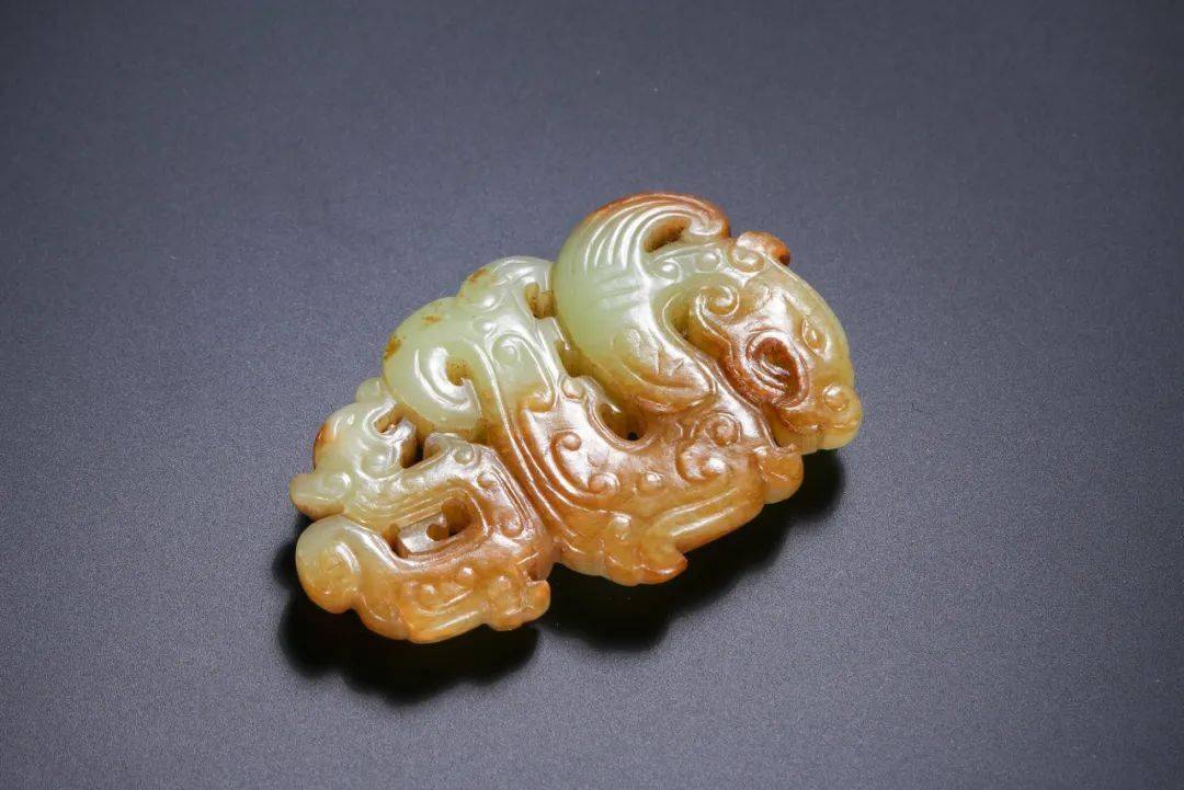 工字佩是汉代流行的一种佩饰,其功能主要是辟邪和护身,可能由司南发展