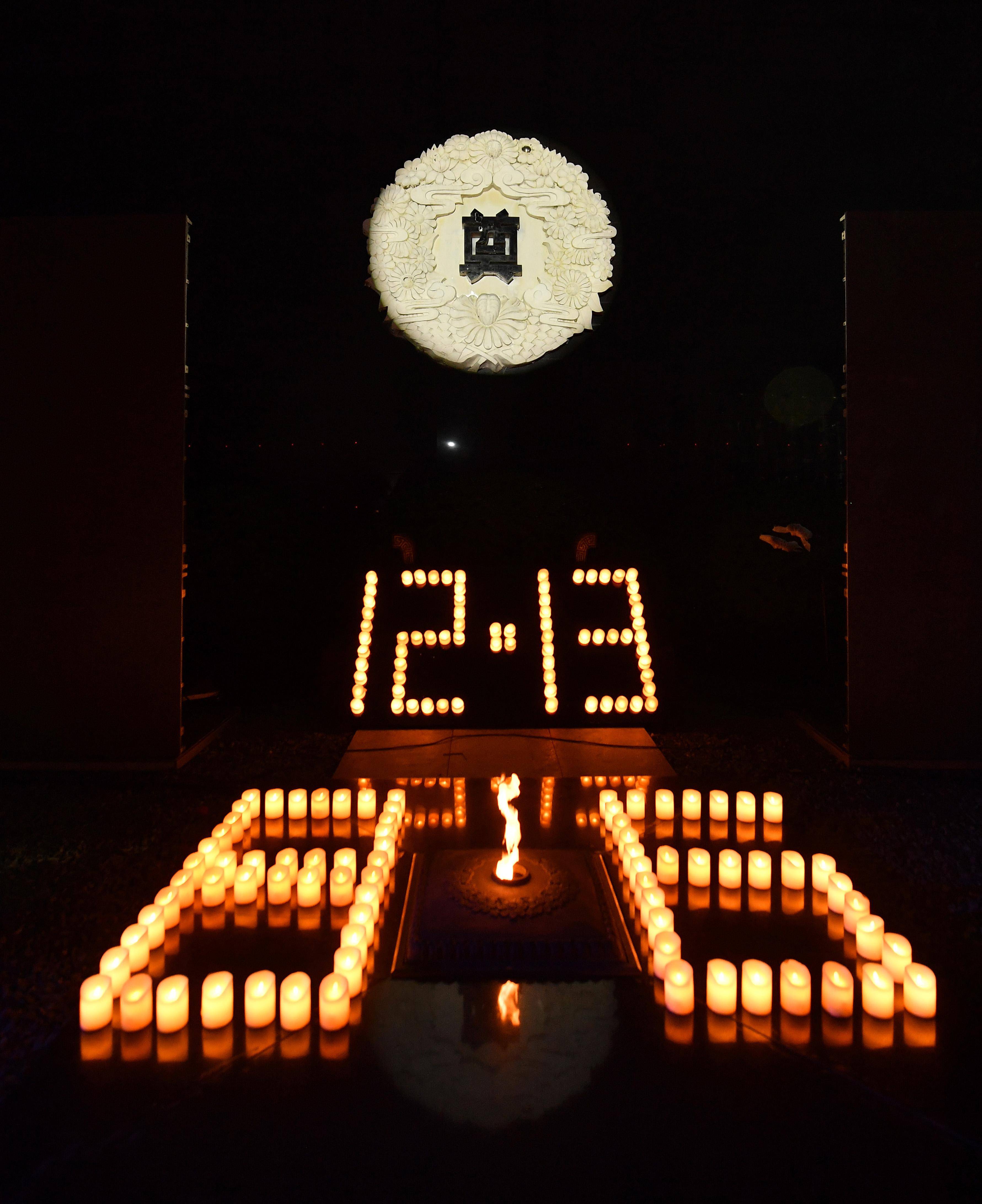 南京:"烛光祭"寄托哀思祈愿和平